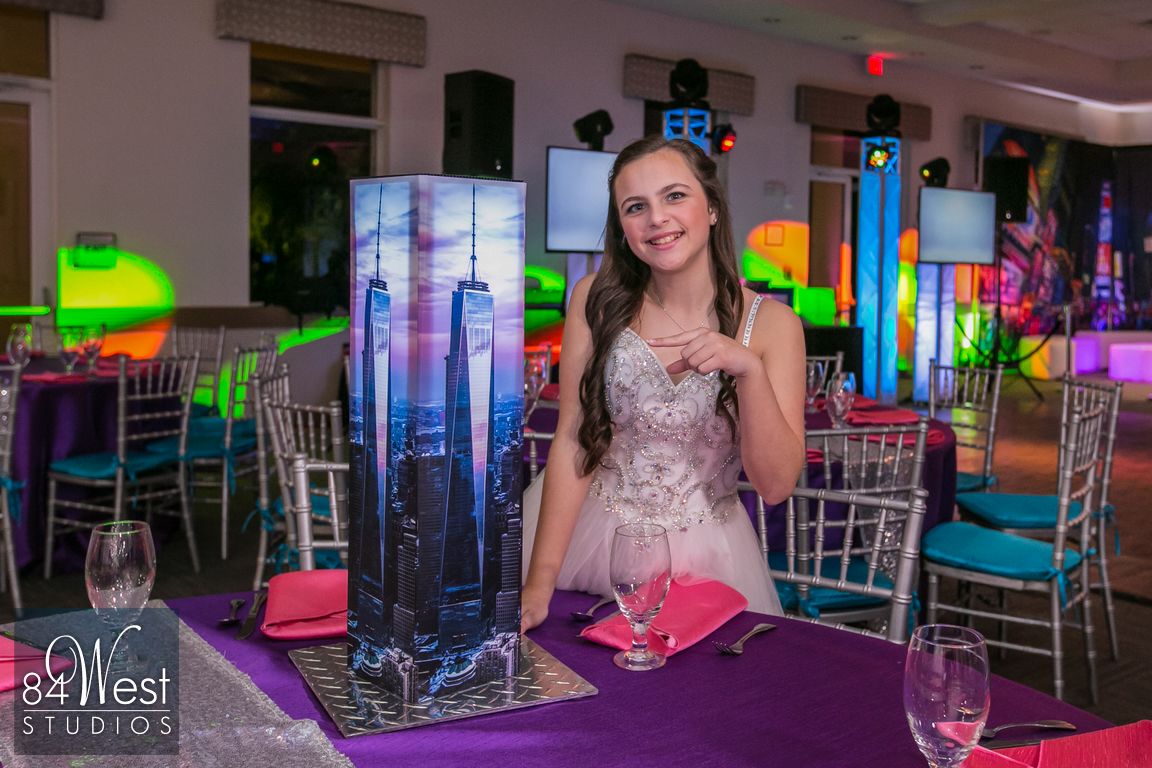  girl posing with Freedom Tower NYC decor