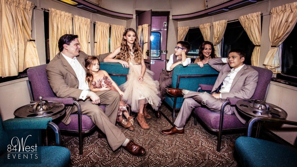 purple family shot in carriage