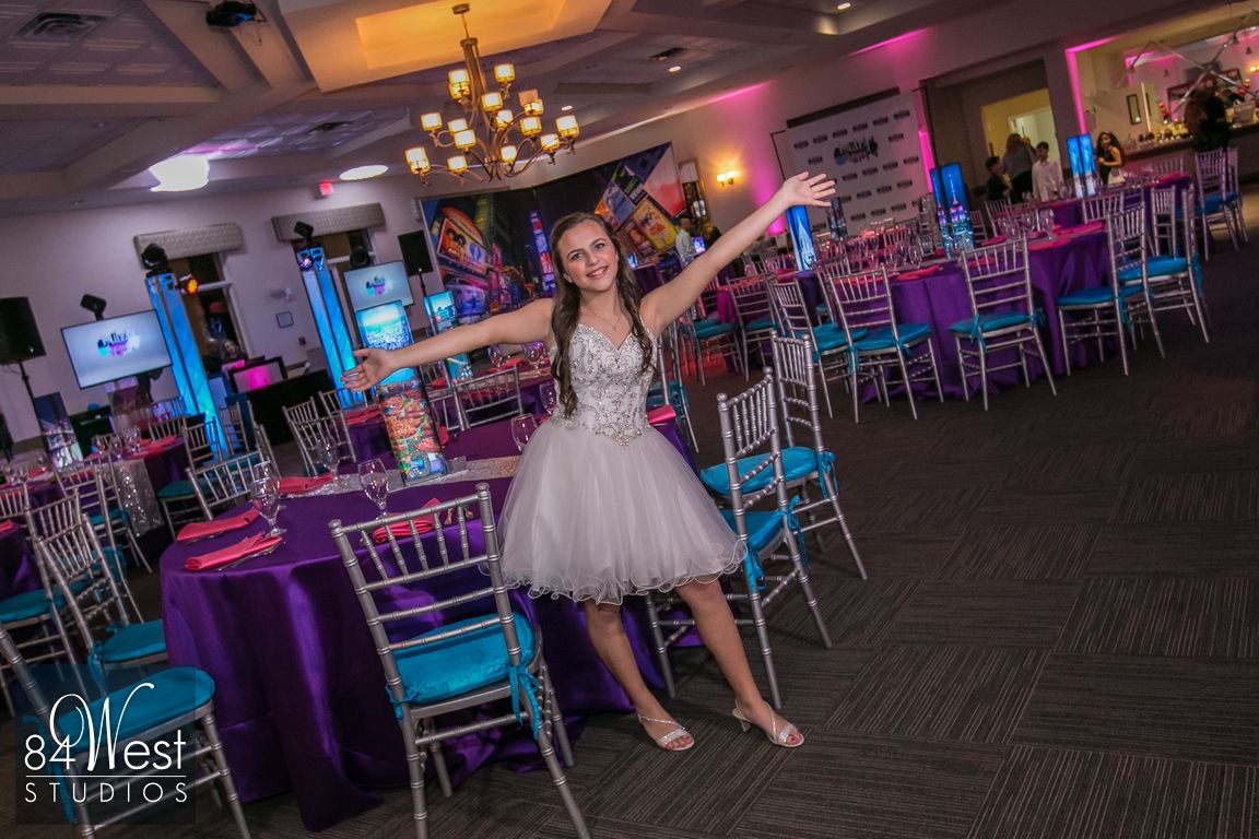 Bat Mitzah girl posing with New York City decor