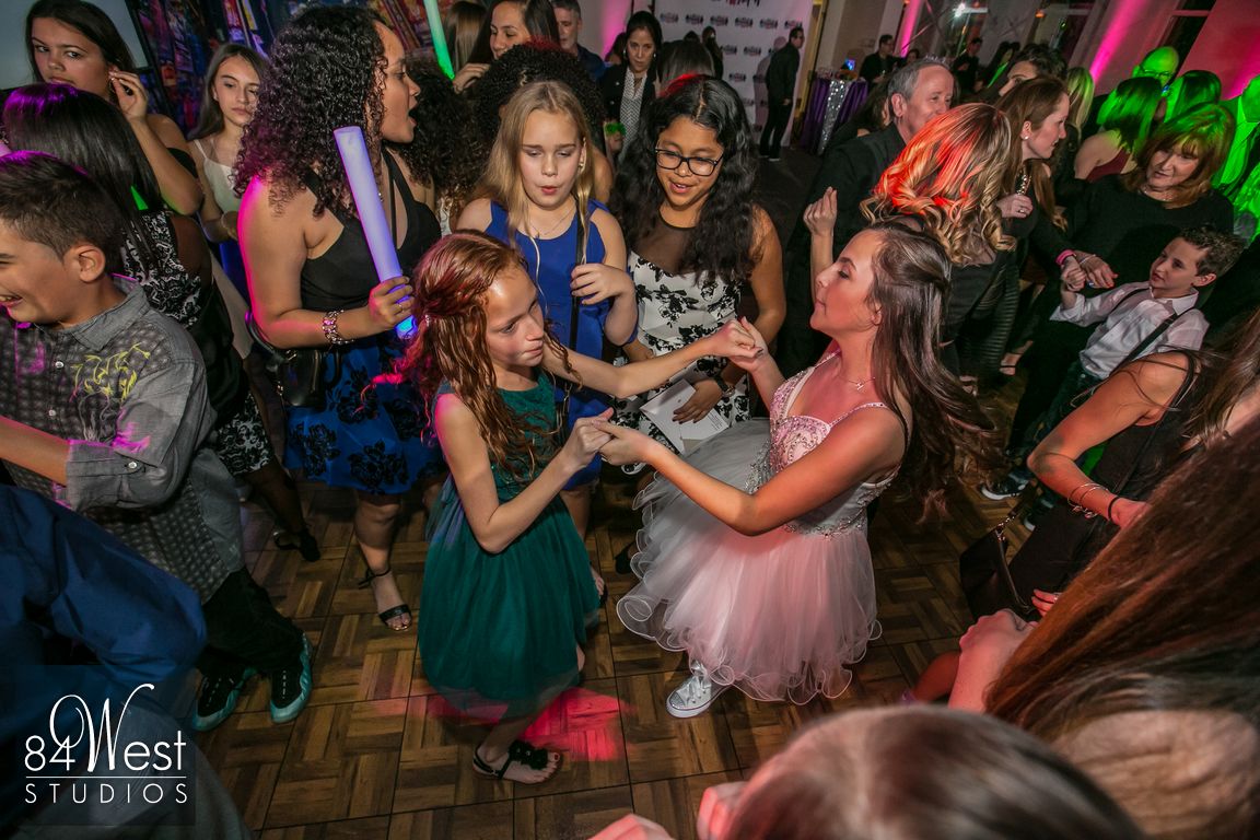dancing party guests hora
