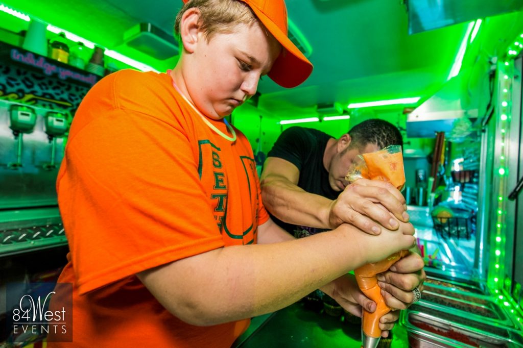 child decorating food