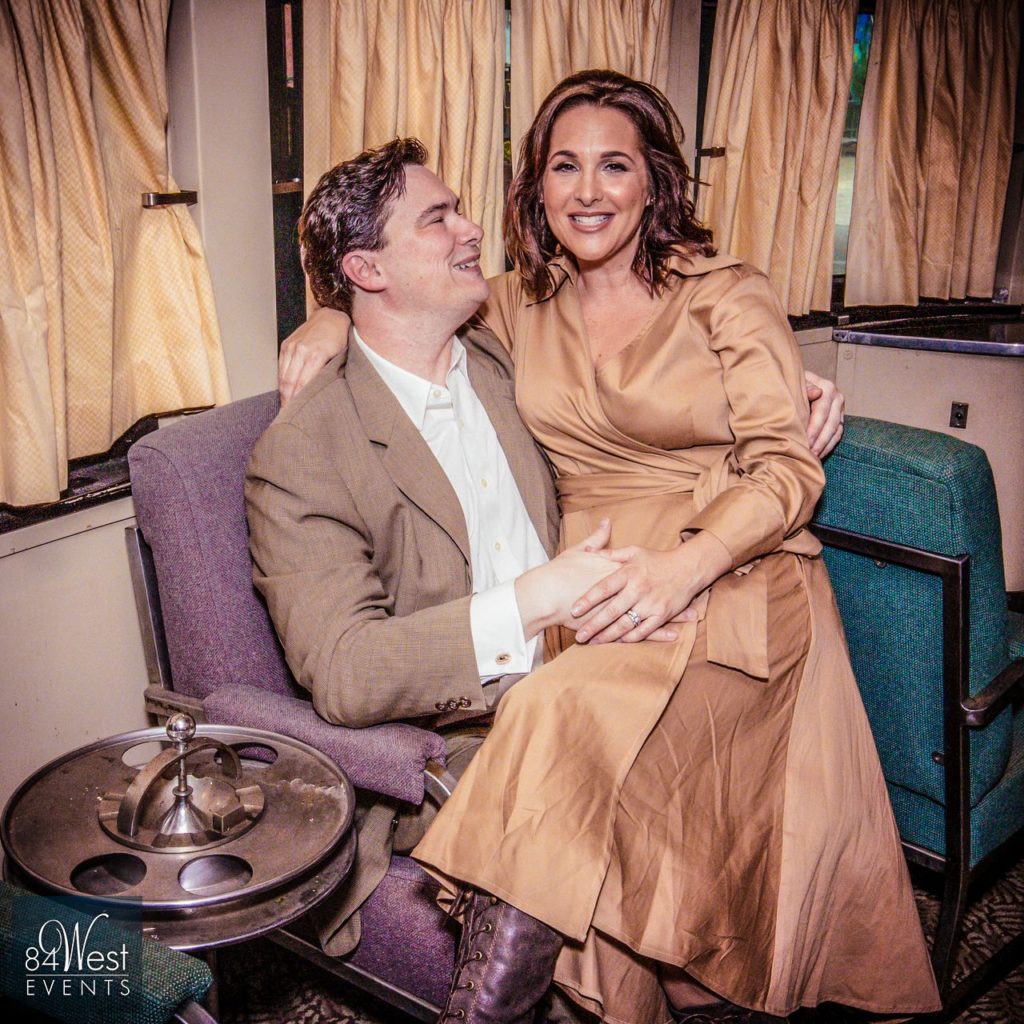 couple posing in train