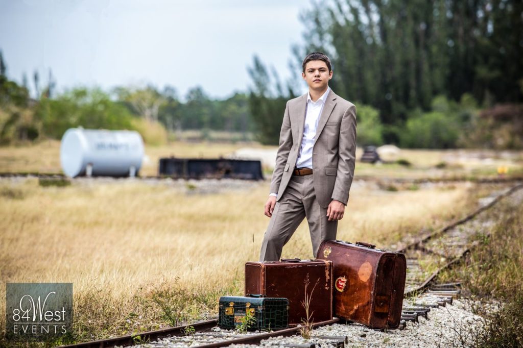 boy and suitcases