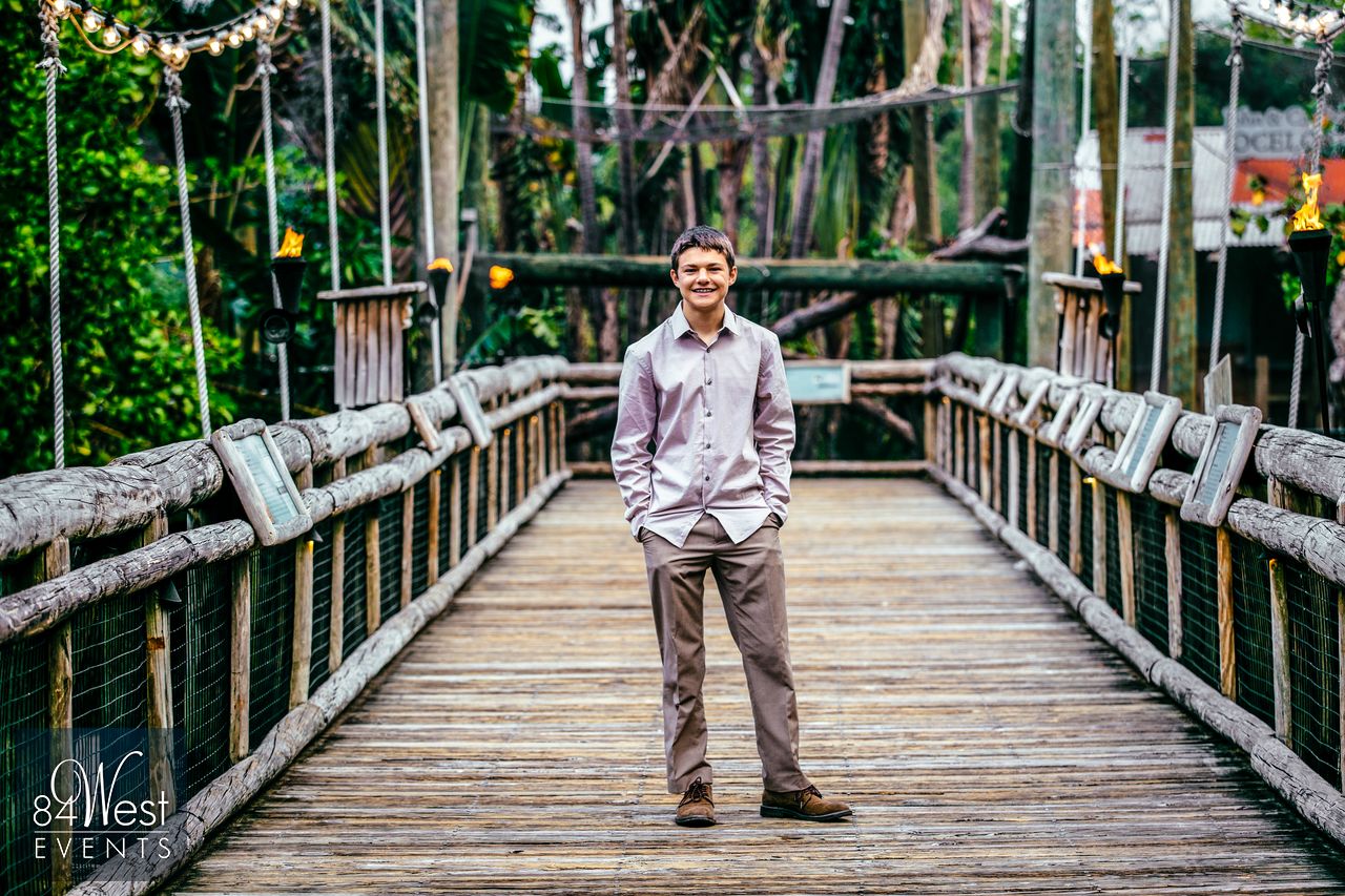 boy on wooden walkway